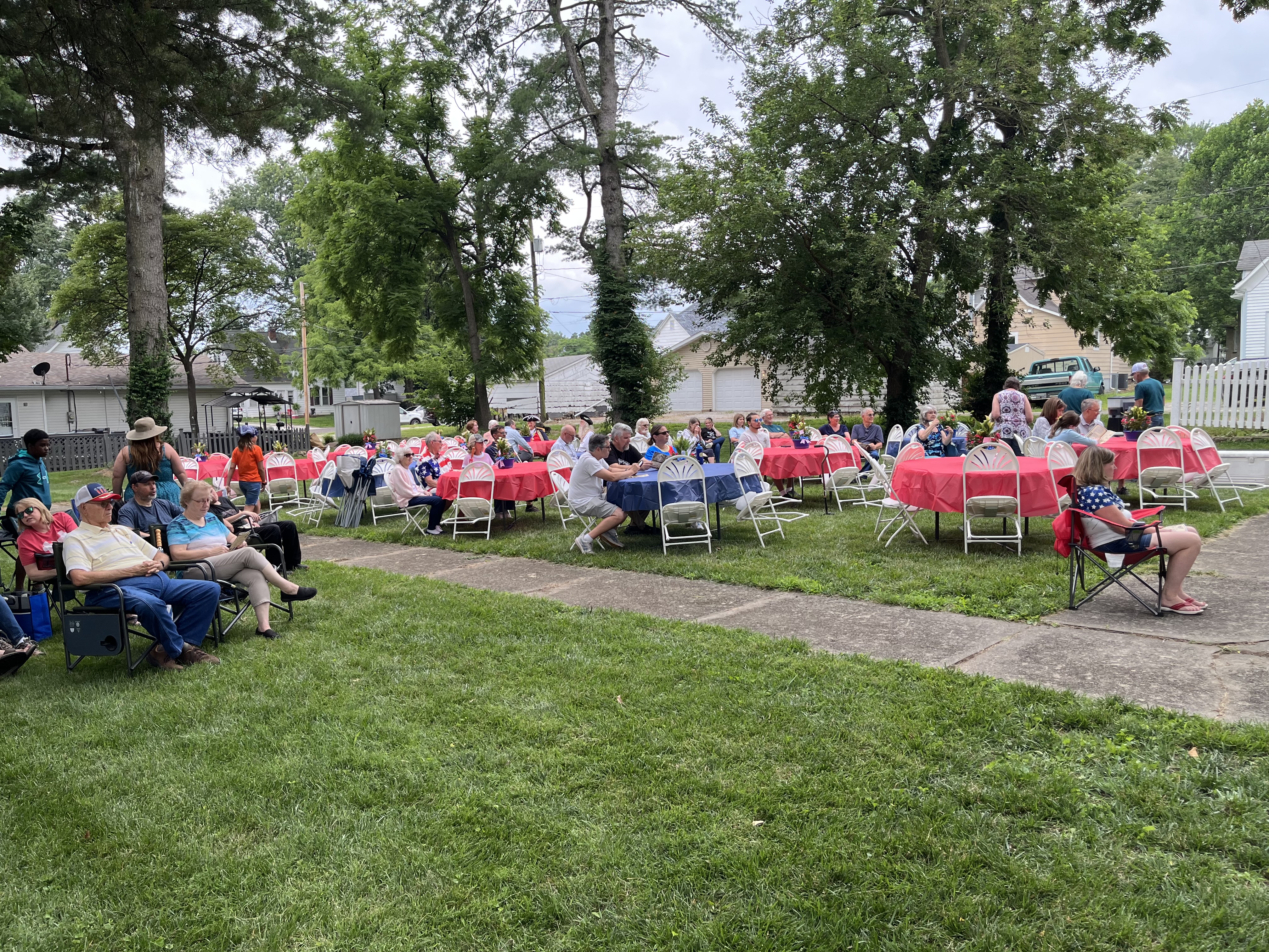 Guests gathering on the Bond County Museum grounds